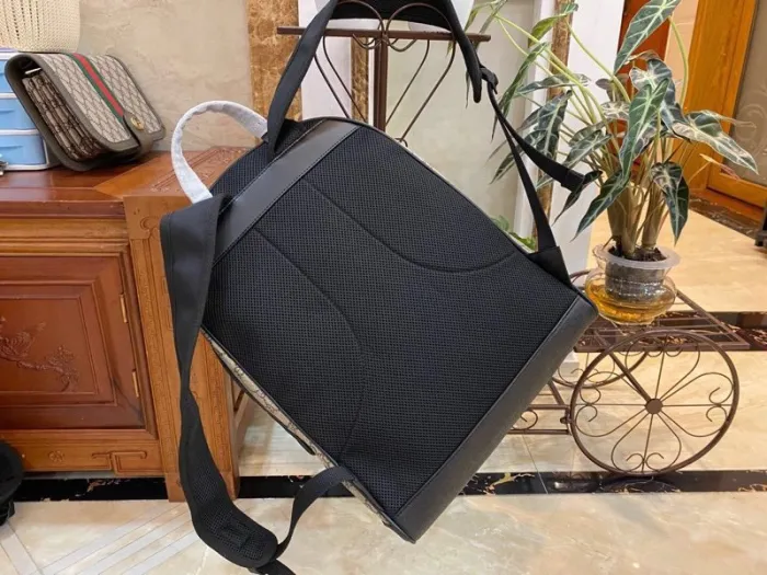 Replica GUCCI MEDIUM GG BACKPACK WITH TAG - top-tier luxury replica shoulder bag
