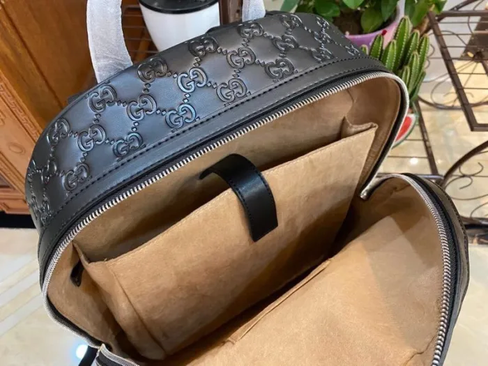Replica GUCCI MEDIUM GG BACKPACK WITH TAG - high-quality designer bag clone