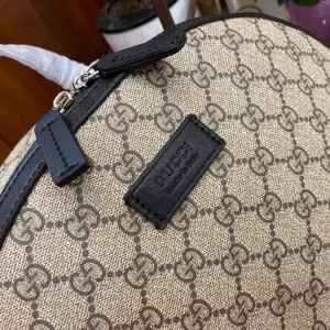 Replica GUCCI MEDIUM GG BACKPACK WITH TAG - authentic-look luxury purse replica