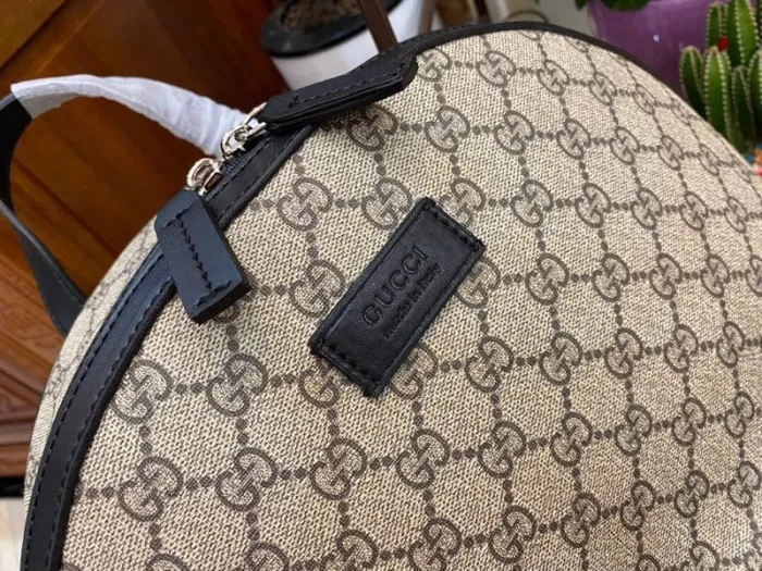 Replica GUCCI MEDIUM GG BACKPACK WITH TAG - authentic-look luxury purse replica